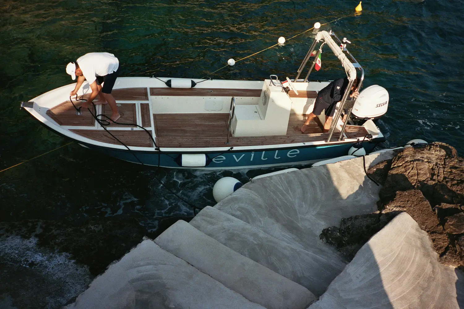 Pergola-shaded garden corner with maritime pines demonstrates the estate’s preference for indigenous vegetation