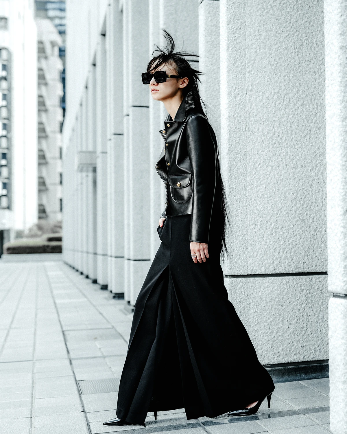 Ramona Deckers - Tokyo - Jacket and sunglasses Celine, skirt Auralee, heels stylist's archive, rings Buccellati