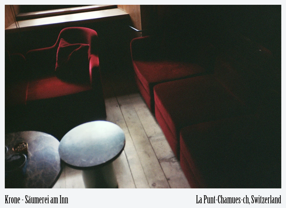 Reclaimed velvet lounge seating in low-impact design at Krone La Punt Hotel