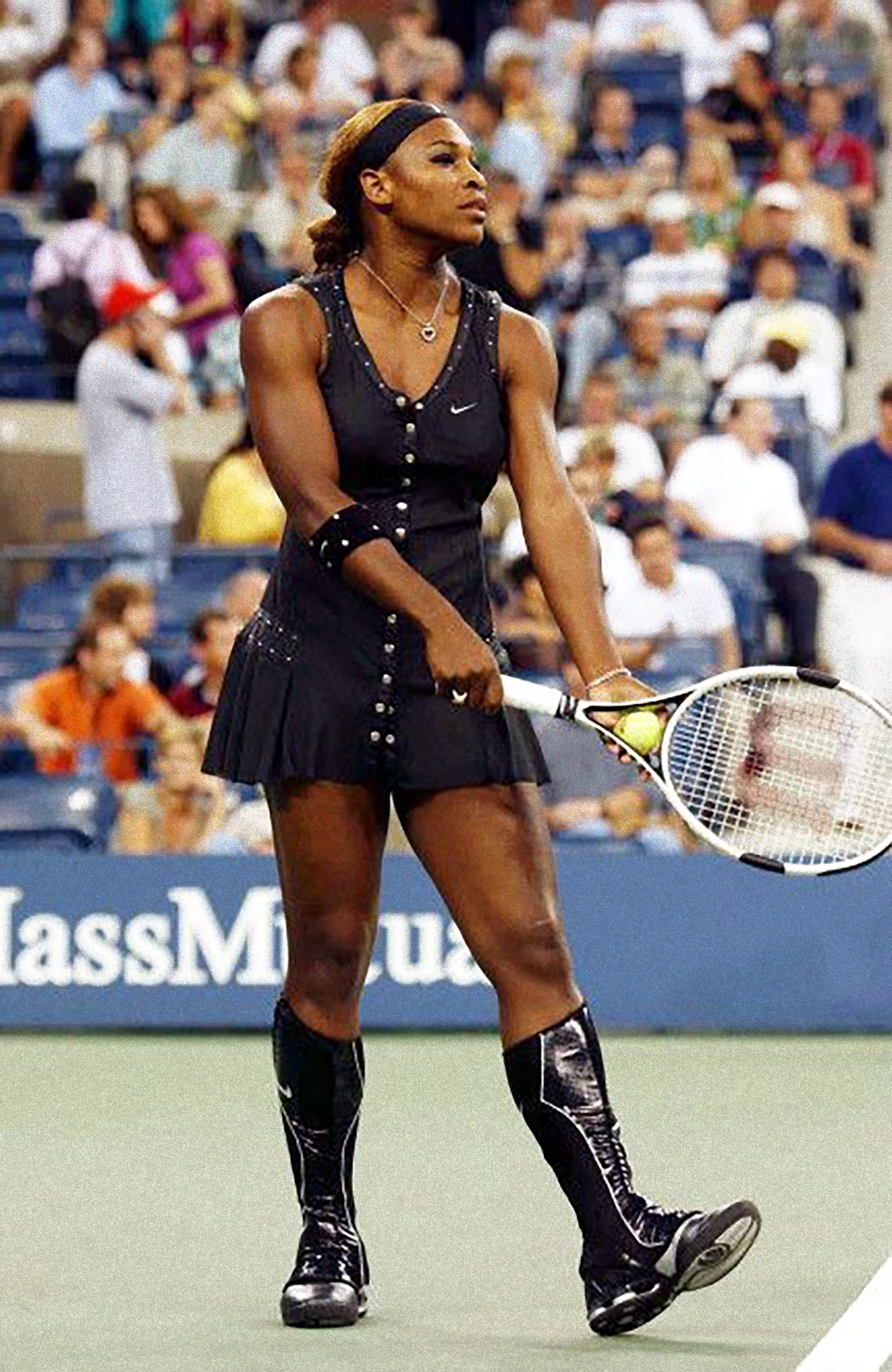 Serena Williams Nike uniform playing a match