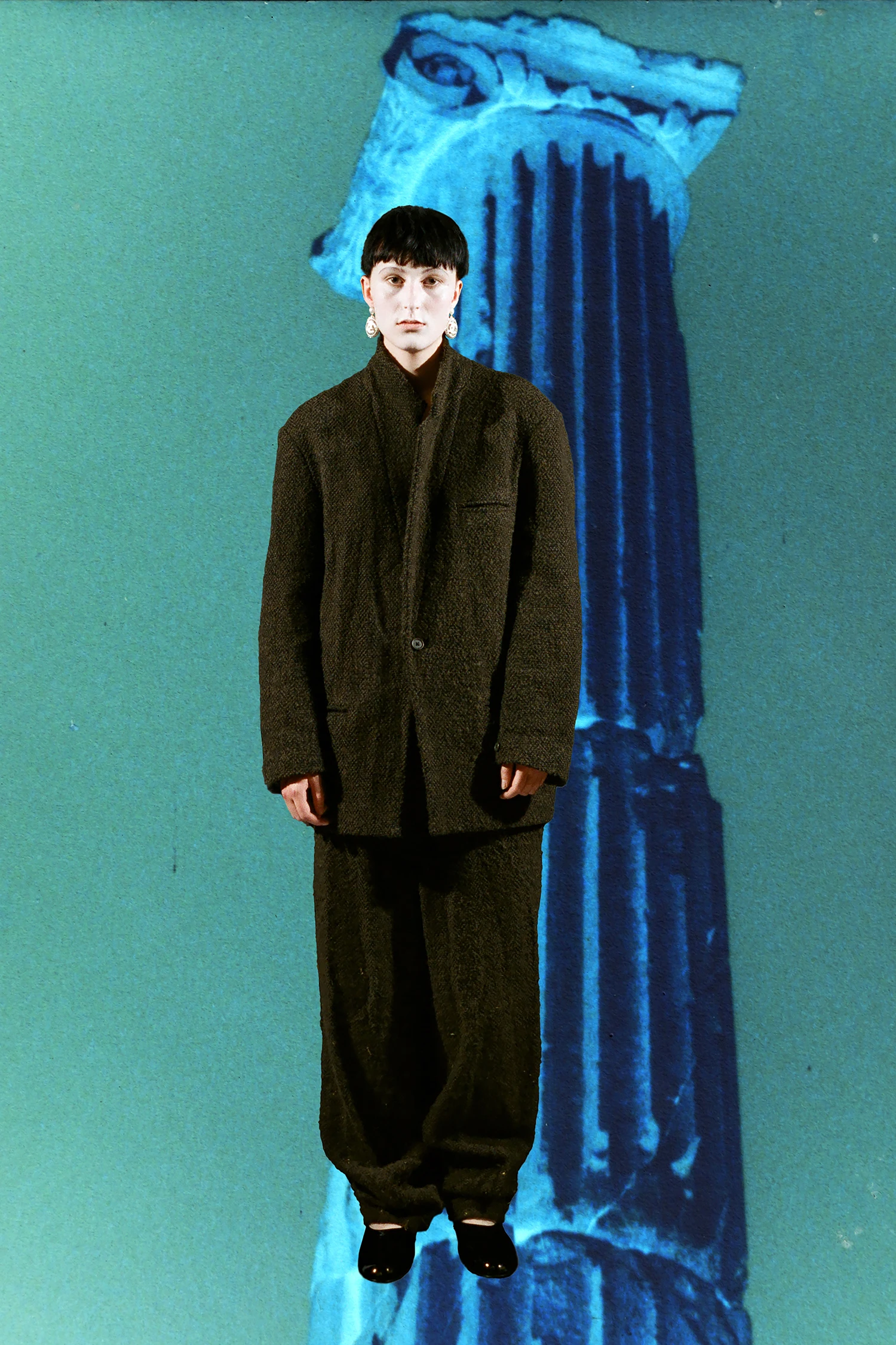 Sweater Cav Empt, shorts Sunspel, shoes Chanel. Photography Guy Bolongaro, styling Lottie Collins