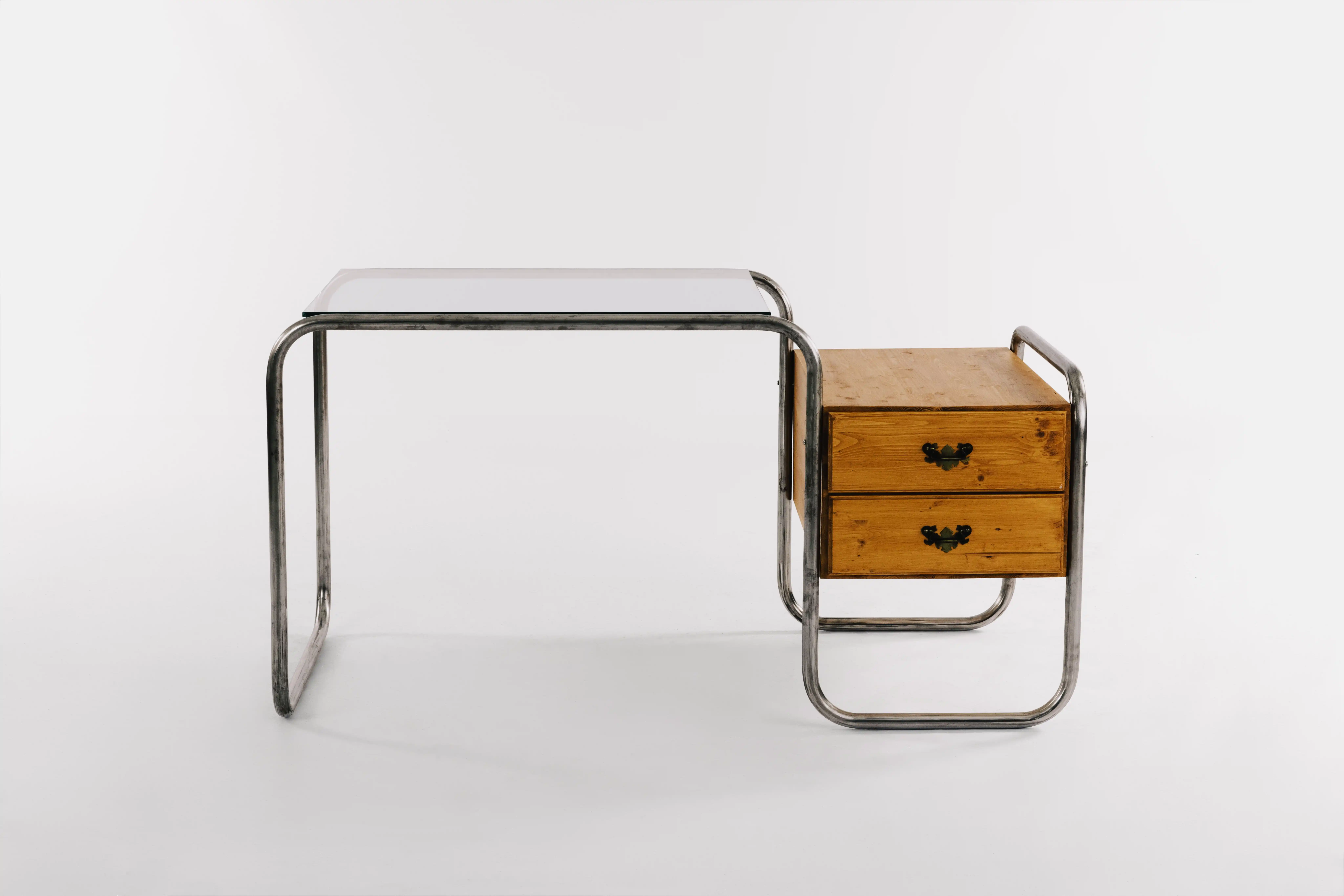 One of László’s desks featuring drawers from the wooden furniture in Attila’s store. Courtesy of Universal Pictures