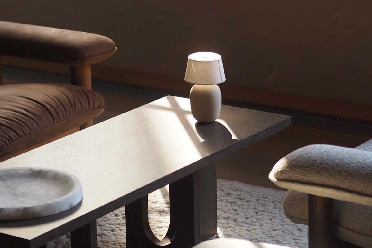 The classy Androgyne Lounge Table in smoked oak or walnut