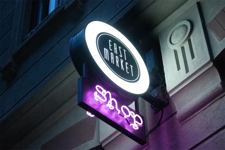 The exterior sign of the East Market shop in Porta Venezia