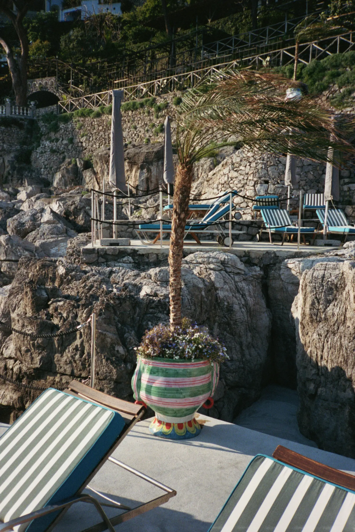 Traditional wooden gozzo tender at the private landing connects guests to the working seascape of Campania_2 VIlla Treville 