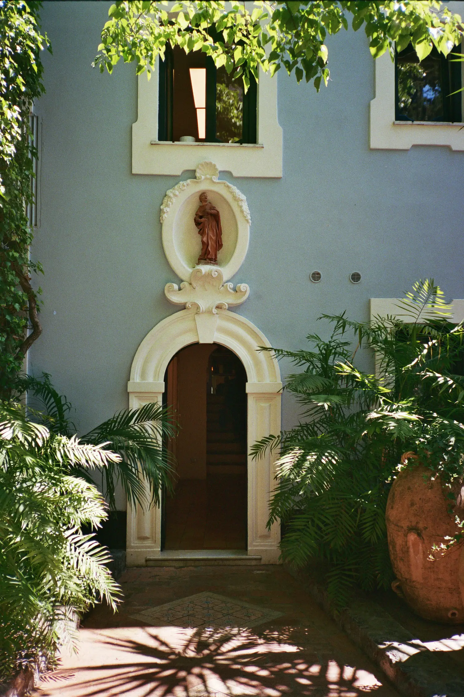 View toward Positano’s stacked houses places the estate in dialogue with its urban and natural context