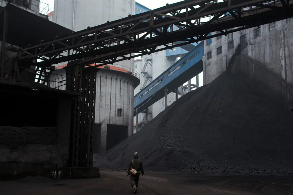 Lampoon, Xinwu coal mine, a coal mining company that has been hit by the falling price of the fossil fuel leaving the firm struggling to repay its loans, Shanxi Province