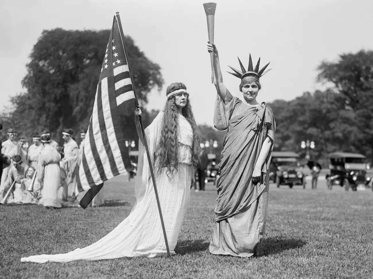 Lampoon, women dress up for a Fourth of July gathering in 1919