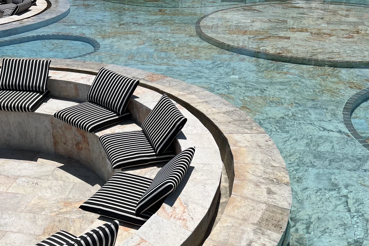 Sunken circular lounge surrounded by water