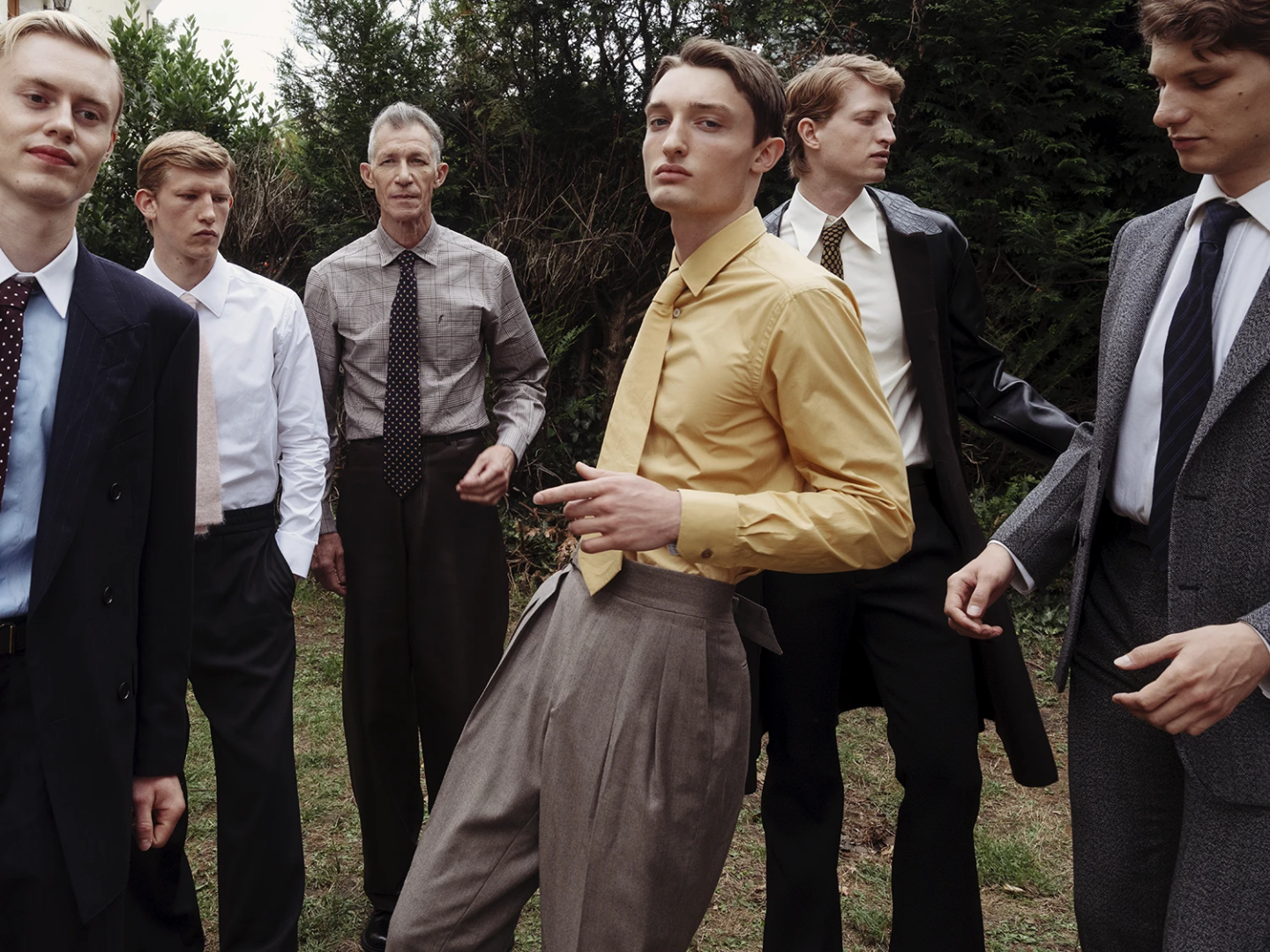 from left to right, shirt and pants Paul Smith, shoes Ferragamo; suit, shirt, tie and shoes Tom Ford, belt Ferragamo, shoes Prada; suit Gucci, shoes Prada