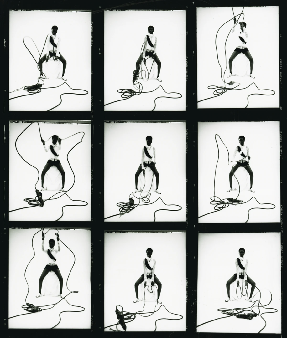 Top Dior, vest Selasi, shorts Elce Swim, shoes Puma