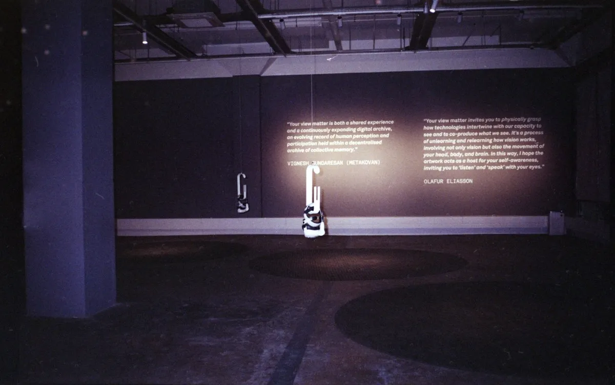Quotes by Eliasson and Sundaresan displayed in the exhibition space.