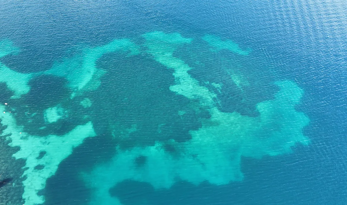 Hito Steyerl Stills from: The Island, 2025 Single channel HD video, Cinema; Quantum noise holograms; Archaeological projection spheres; Documentary videos. Duration 26 minutes (Single channel HD video); installation dimensions variable 