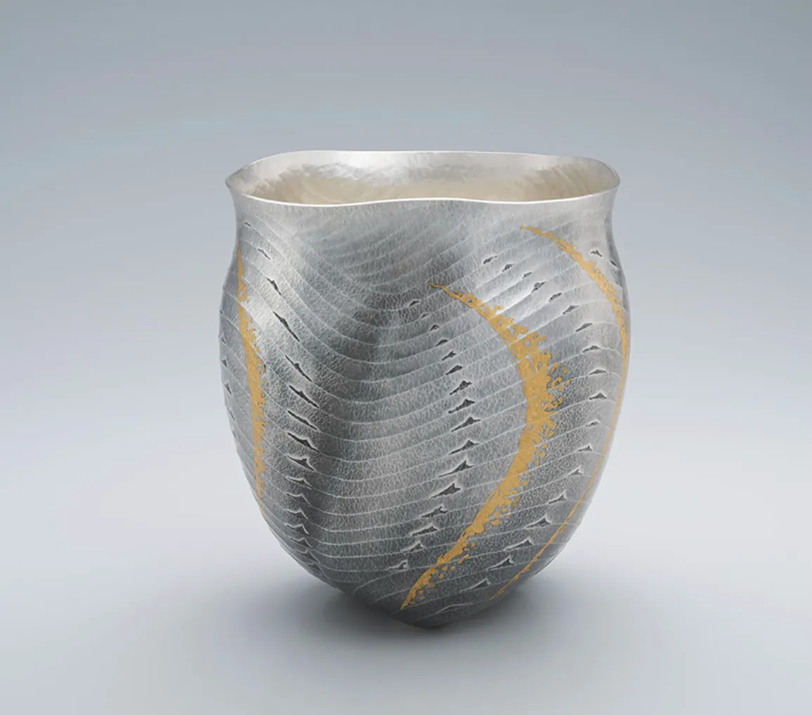 Blue sea, silver flower vessel made by hammer work crafted by Japanese National Living Treasure, Yukie Osumi, image © Japan Kôgei association
