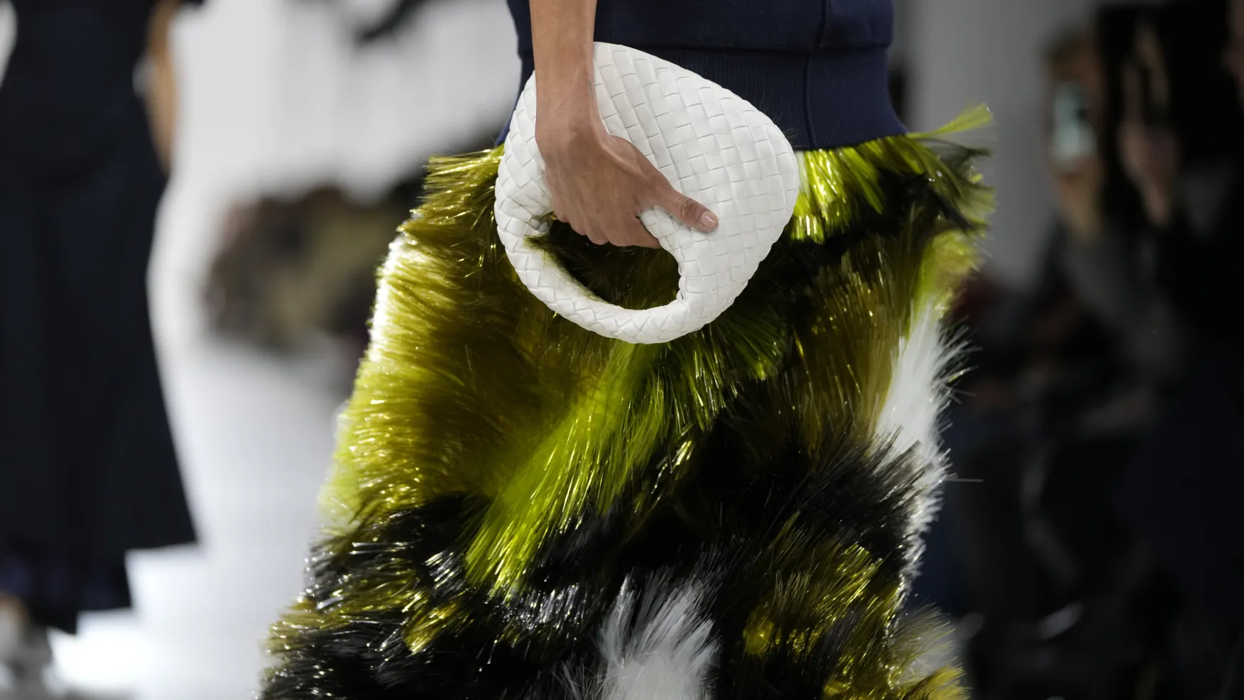 A model wears a look during the Bottega Veneta Spring–Summer 2026 women’s runway show in Milan, Italy, Saturday, September 27, 2025. (AP Photo/Luca Bruno)