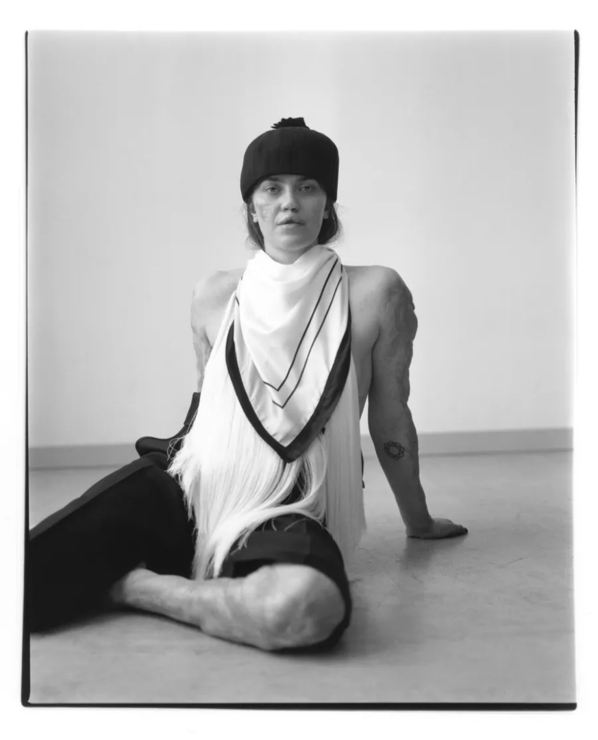 Veronica wears top Calcaterra, shorts and hat Loro Piana