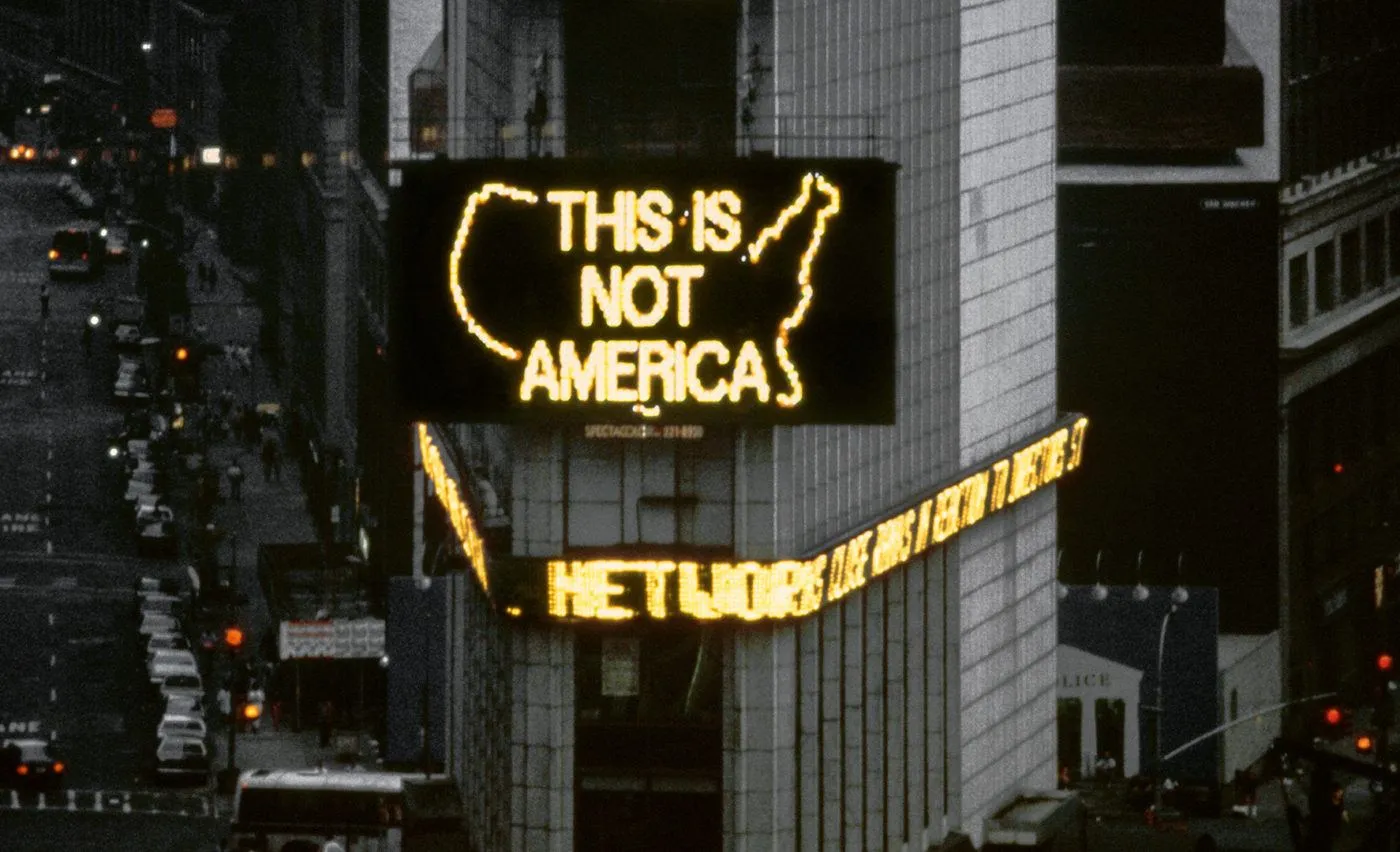 Alfredo Jaar, “A Logo for America,” 1987. Spectacolor animation, Times Square, New York, 1987. Presented as part of Public Art Fund’s exhibition series “Messages to the Public.” Courtesy Jane Dickson and Public Art Fund, New York.