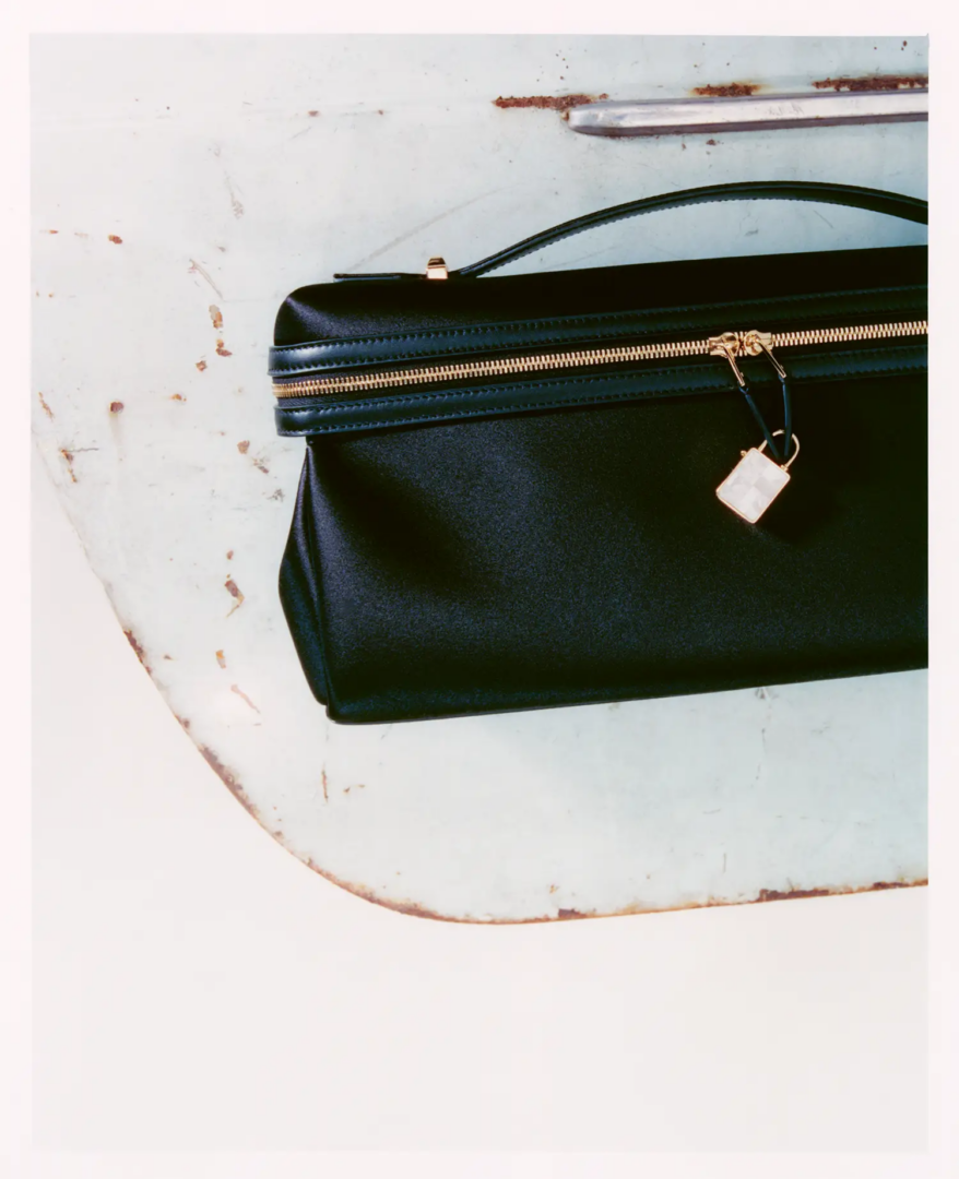 Loro Piana Satin and rounded leather Extra Softy L33 bag, photography Adrien Dubost