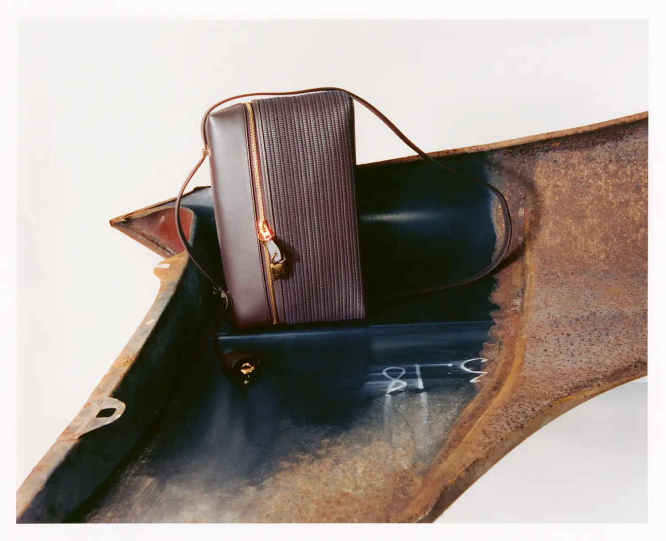 Loro Piana woven and Rounded leather Extra bag L27, photography Adrien Dubost