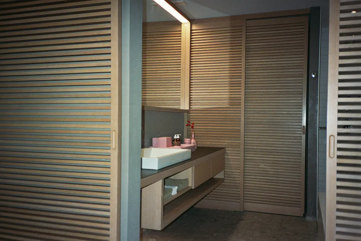 Zermatt. Timber-louvered vanity conceals the recycled-heat plumbing. Cervo Mountain Resort