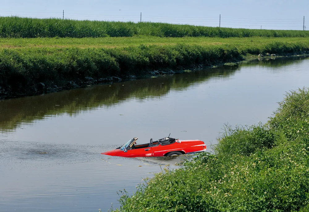 Red Convertible in the Canal, 2022, photography Roe Ethridge from the book Rude In The Good Way