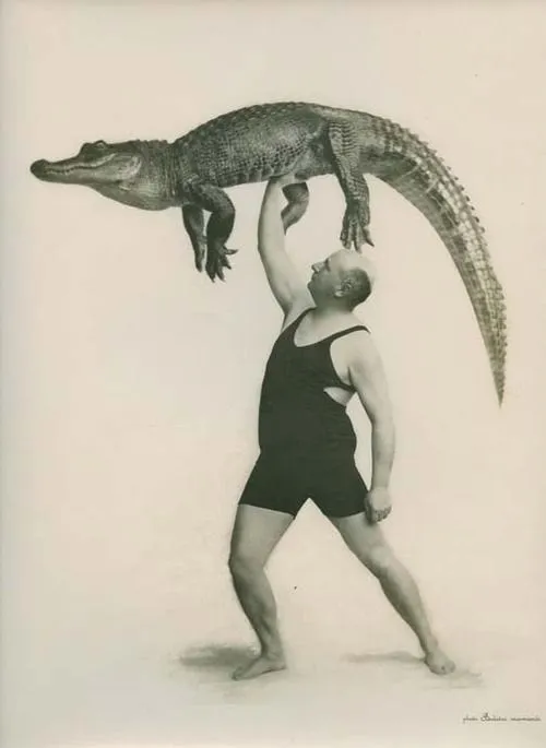 Captain Wall and crocodile. France, circa 1940