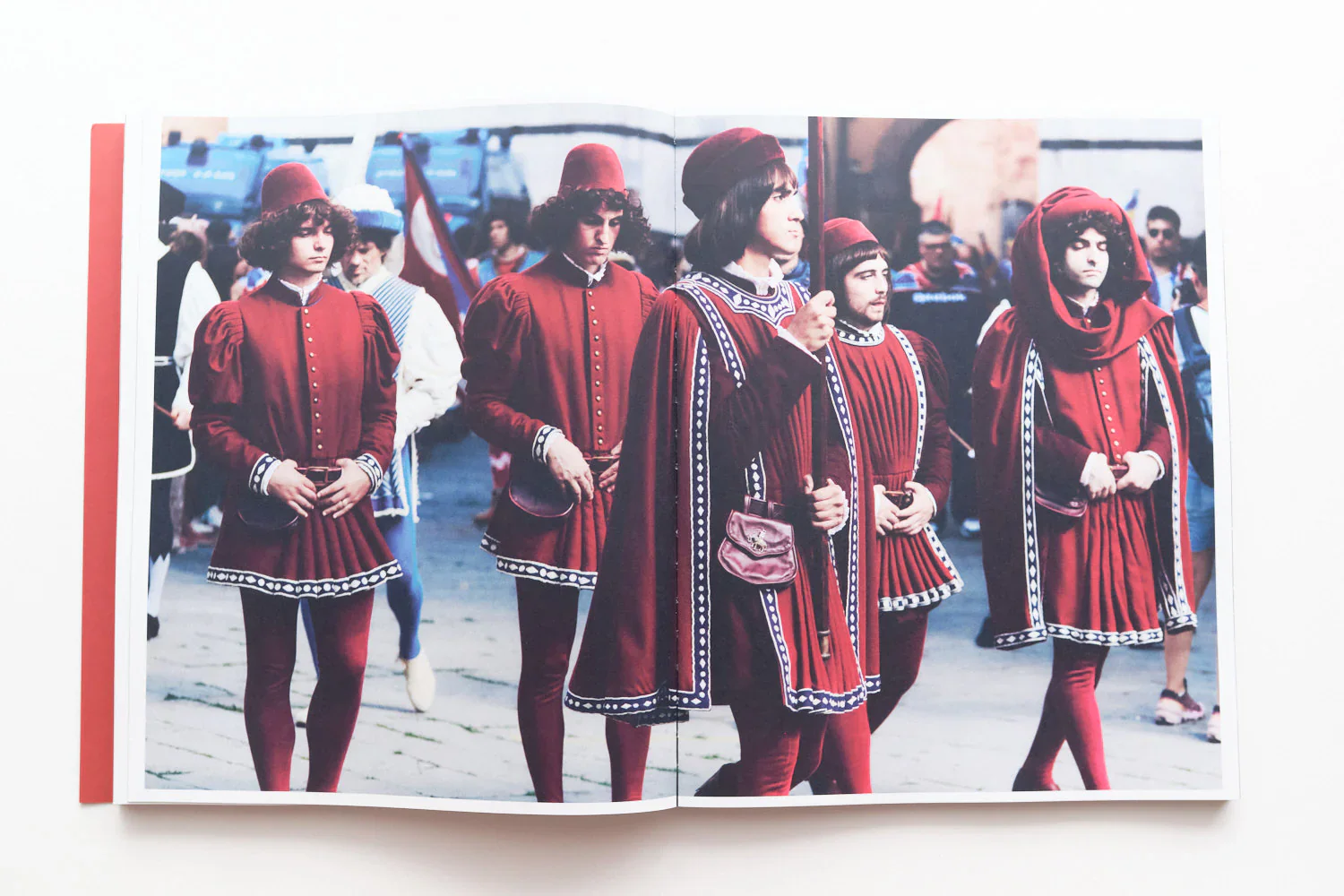 I Ragazzi is a photographic publication by Ed Aked examining representations of masculinity within the social and ceremonial context of the Palio di Siena