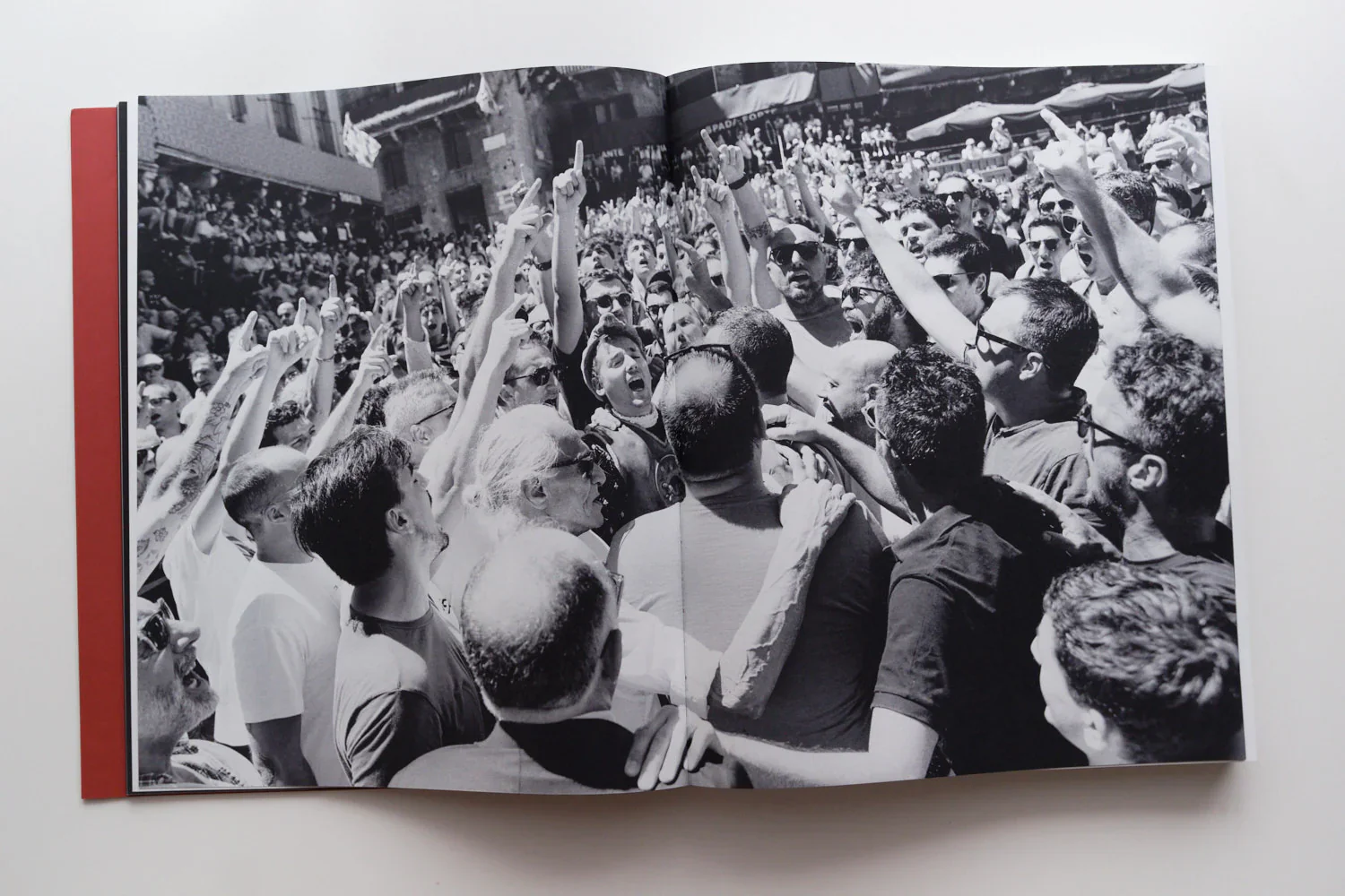 I Ragazzi is a photographic publication by Ed Aked examining representations of masculinity within the social and ceremonial context of the Palio di Siena