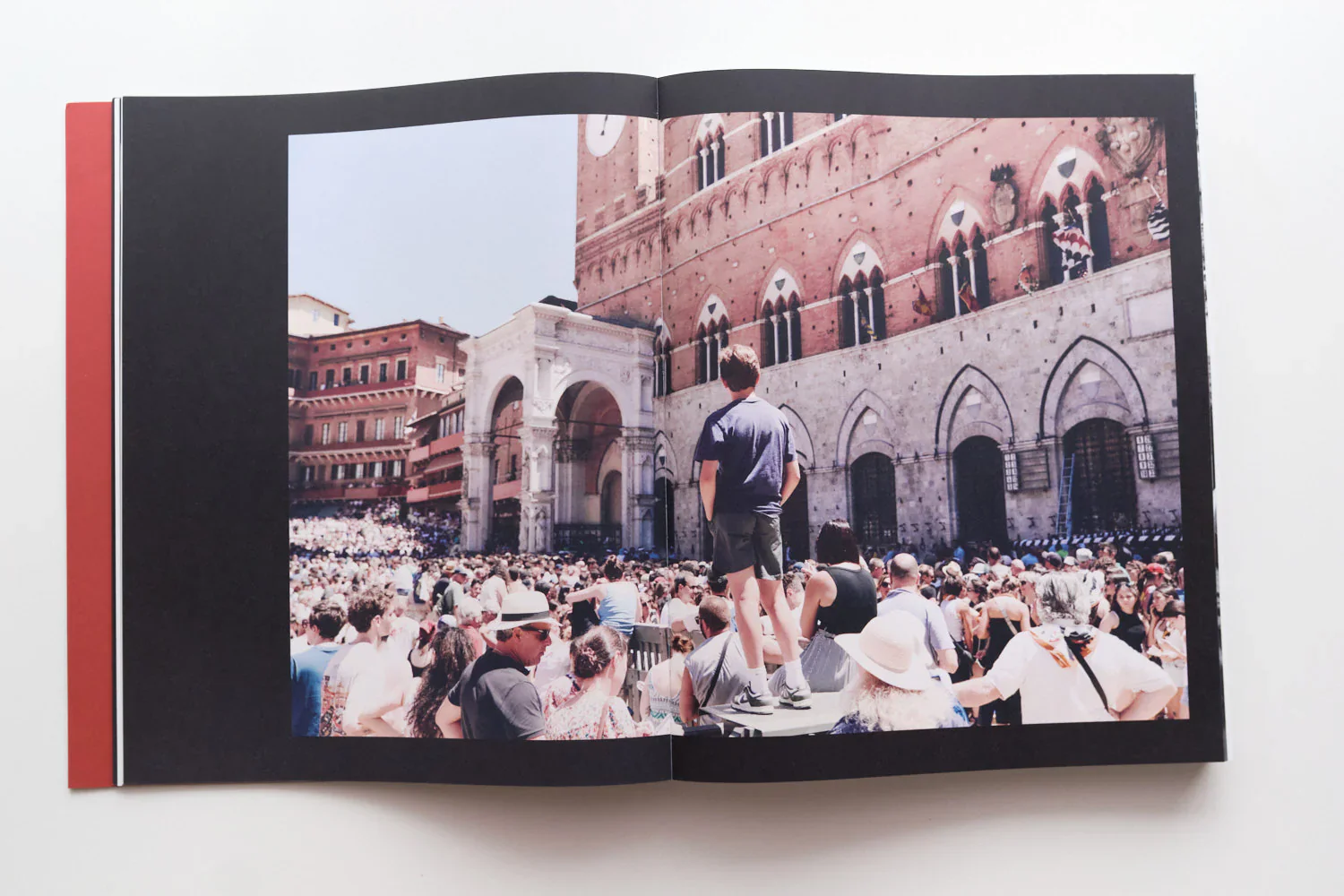 I Ragazzi is a photographic publication by Ed Aked examining representations of masculinity within the social and ceremonial context of the Palio di Siena