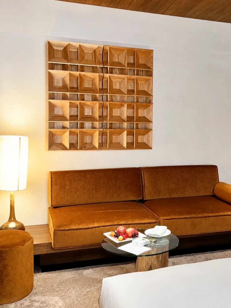 A custom wood element inside one of the Iconic Rooms, part of the material language developed for Aurora’s new interiors