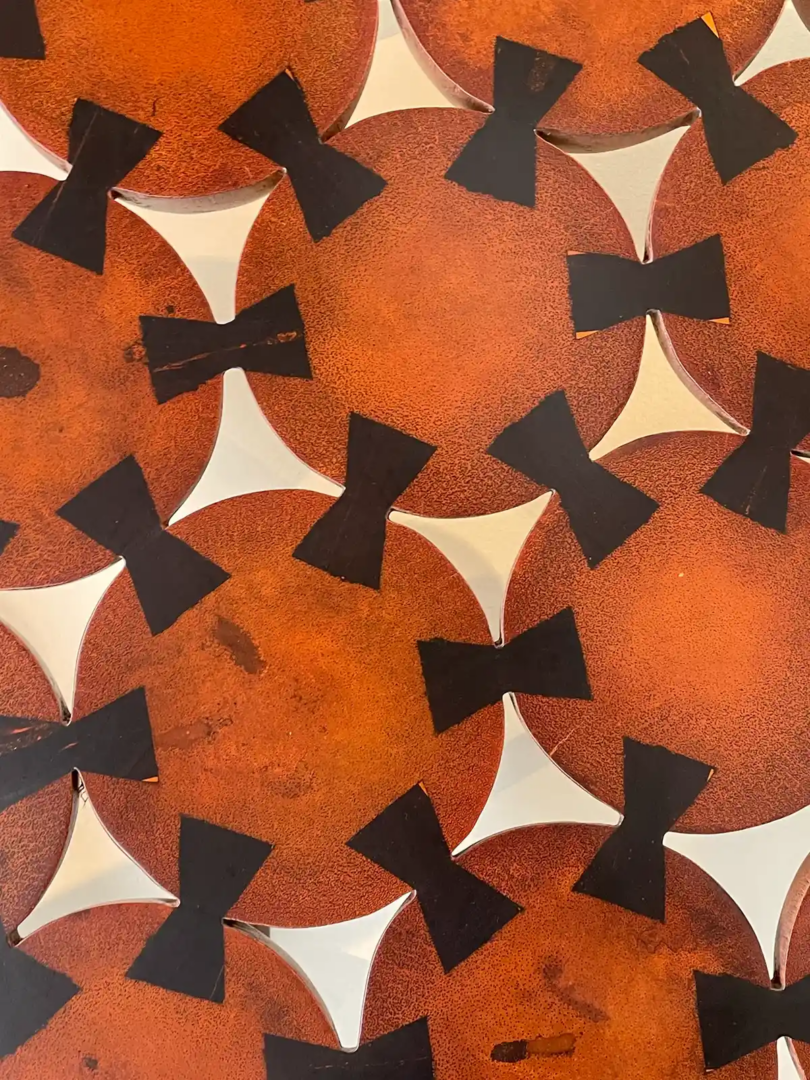 Jean-Servais Somian coconut wood composition with circular reddish-brown forms, black geometric joints and white triangular inlays