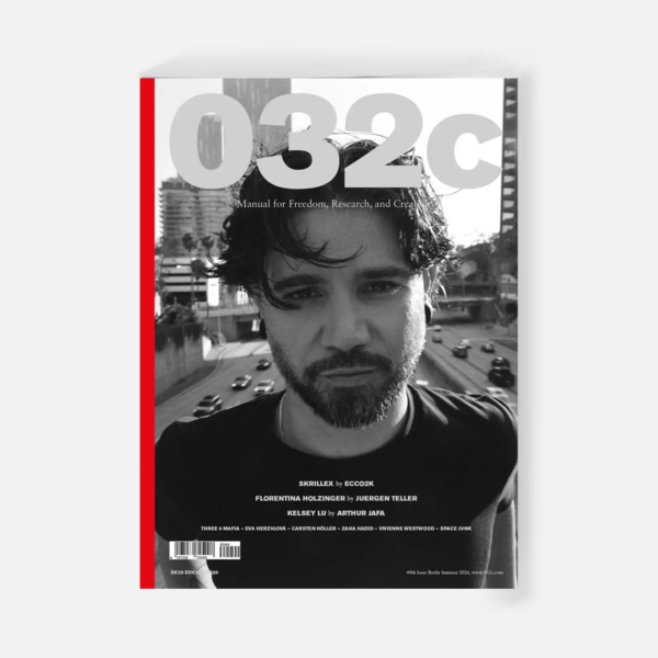 Cover of 032c Issue 49 featuring a black-and-white close-up portrait of Skrillex with tousled dark hair and a beard, photographed outdoors above a city roadway. Oversized gray 032c lettering spans the top, with a red vertical stripe along the left edge.