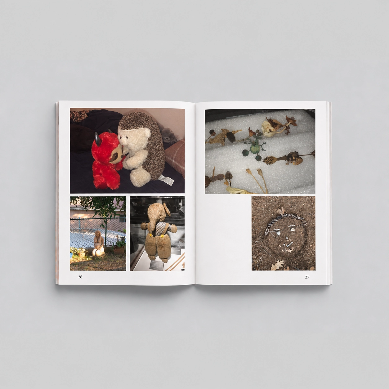 Open pages of Daphne, featuring stuffed animals, figurines, pewter sculptures and arrangements of natural materials.