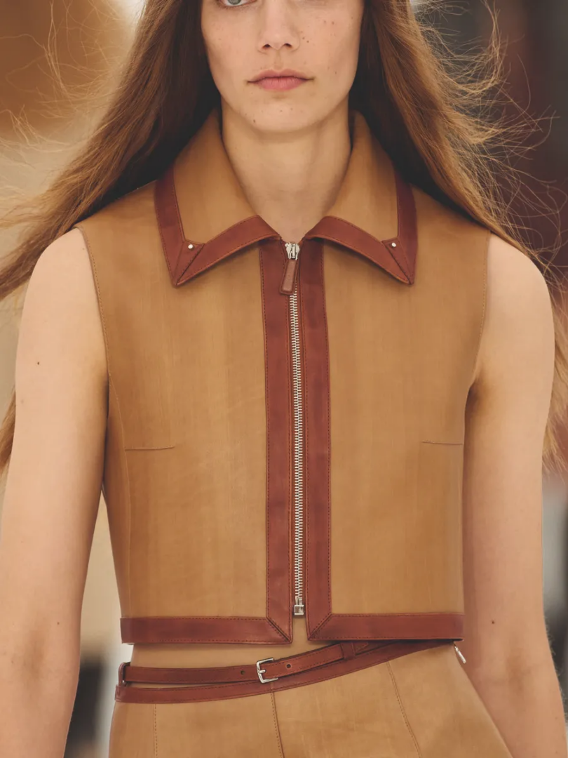 Hermès SS27 brown leather-trimmed sleeveless top with exposed zipper and narrow leather belt