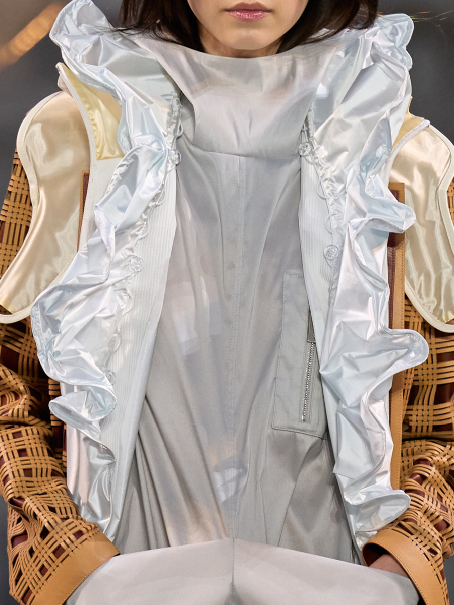 Louis Vuitton SS27 white sheer layered garment with button fastening, draped construction and ruffled cuffs