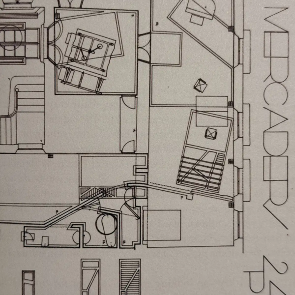 Black-and-white architectural floor plan showing room layouts, staircases, furniture arrangements and structural details, with the text “MECANEDA 24 BB” along the right side.