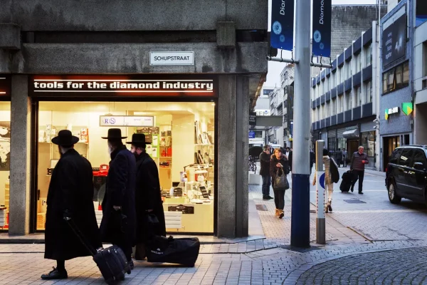 Lampoon, A group of Orthodox Jewish men walking past a shop that sells tools to the diamond industry in Antwerp_s Diamond Quarter, Tim Dirven