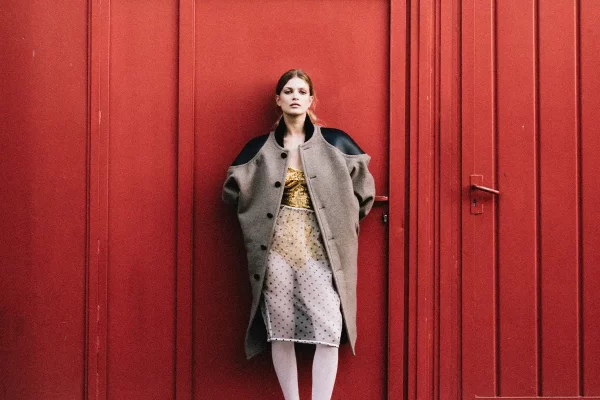 Coat Louis Vuitton, body and skirt Rosamosario, shoes Jimmy Choo x Jean Paul Gaultier, stocking stylists own. Photography Luigi Cianfrano, styling Chiara Buccelli