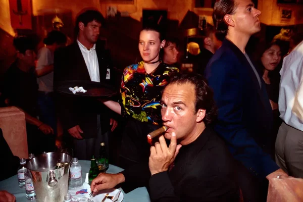 Lampoon Hollywood Star James Belushi smokes a cigar at the opening of Planet Hollywood restaurant in Canton Road