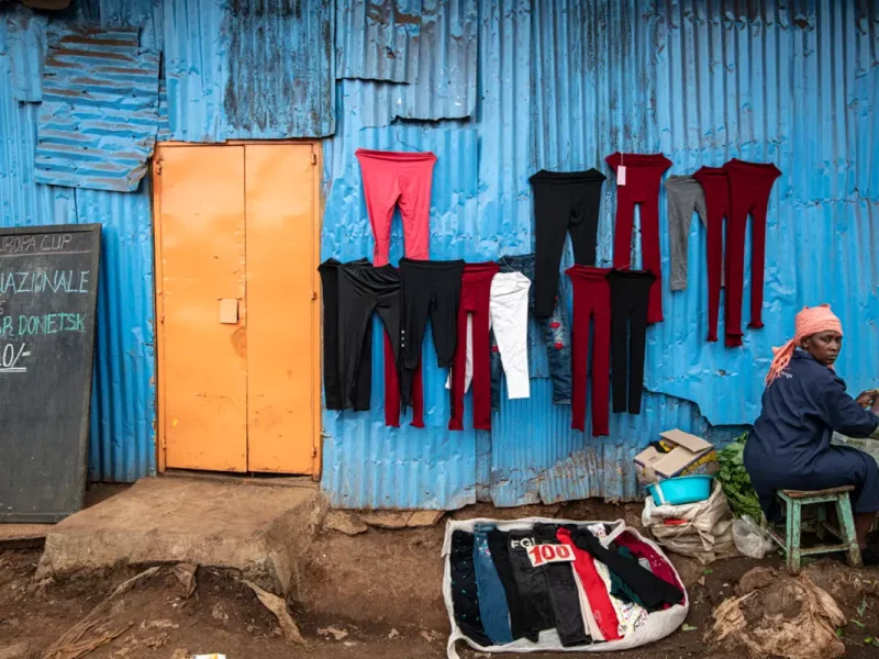 Kibera, Nairobi, Kenya A clothes stall in Kibera, Simon Townsley, Panos Pictures .