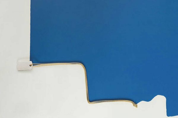 TIFFANY-REED-KRAKOFF TIFFANY 1837® MAKERS I.D. TAG PENDANT IN STERLING SILVER AND 18K GOLD, 24''. IMAGE: TOMMASO MARINIELLO