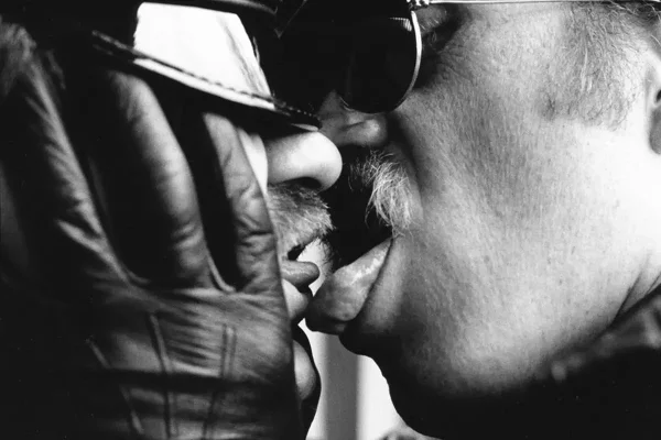Lampoon, The kiss. Photography Jim Wigler